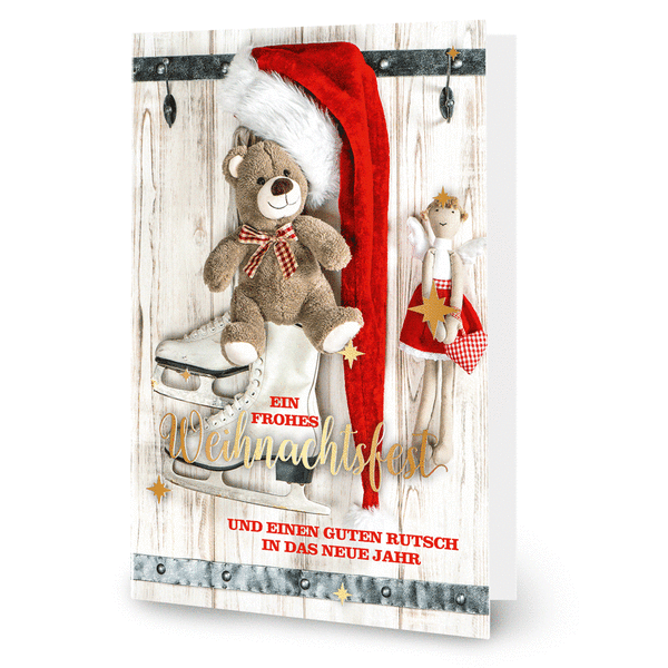 Weihnachtsfest mit Schlittschuhen und Teddybär