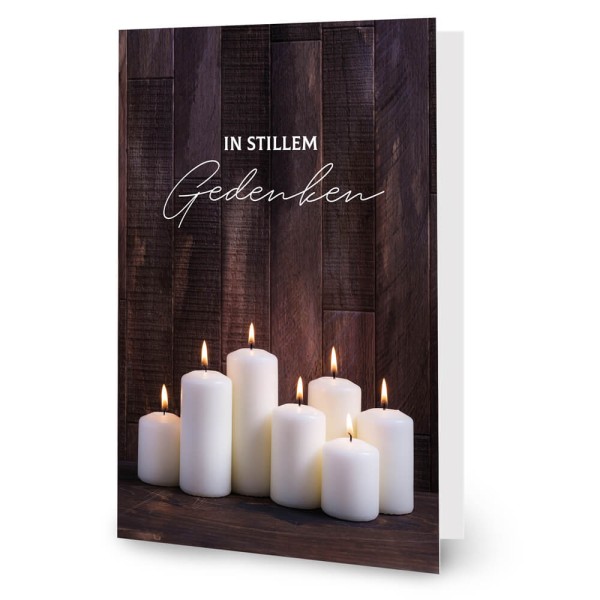 Trauerkarte mit brennenden Kerzen